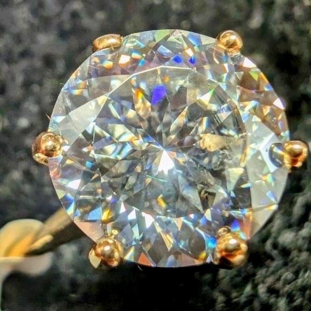 10K Yellow Gold 2.29G 2.42Ct Moissanite Ring.  Beautiful cut.